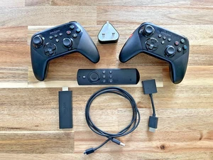 Amazon Fire TV Stick 2nd Generation - with remote and 2 Fire TV Game Controllers - Picture 1 of 11
