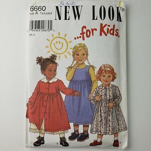 New Look Pattern 6660 UNCUT Toddler Dress or Jumper  Size 1/2- 1- 2- 3- 4-