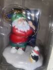 Santa Claus playing golf and penguin Traditions 1996 Westmar Gift Ornament 3?
