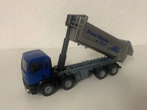 Siku Super 1:55 MAN Fliegl Stonemaster 3524 Muldenkipper Grau Blau Weihnachten - Bild 1 von 15