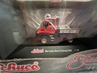 Schuco 21845 H0 1:87 Mercedes-Benz Unimog U300 Pompiere Nuovo In OVP - Immagine 1 di 4