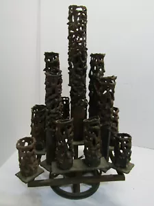 VINTAGE CAST IRON HANDMADE RARE 21 CANDLE HOLDER ONE OF A KIND UNIQUE WHEEL BASE - Picture 1 of 10