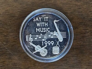 1999 1 ONCIA .999 ARGENTO FINE DILLO CON MUSICA KREWE DI GEMINI IN CAPSULA TONED - Foto 1 di 5