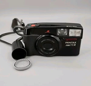 Pentax ZOOM 70-X fotocamera nera punta e scatta pellicola 35 mm - Foto 1 di 7