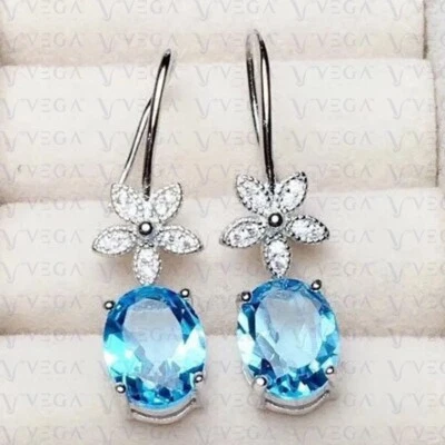 Pendiente par de diamantes y topacio natural corte ovalado de 4,30 quilates enchapado en oro blanco de 18 k Foto 1 de 4