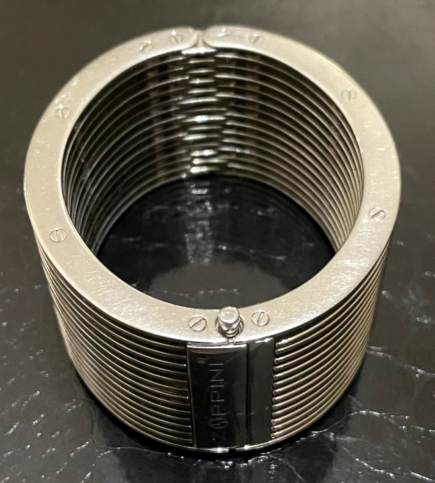 Elegante brazalete ancho con bisagras de acero inoxidable Lord & Taylor Zoppini Italia Foto 1 de 4