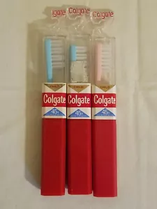 Vintage set of 3 Hard Colgate Child Toothbrush USA Red Case 45 Cents Blue/Pink - Picture 1 of 3