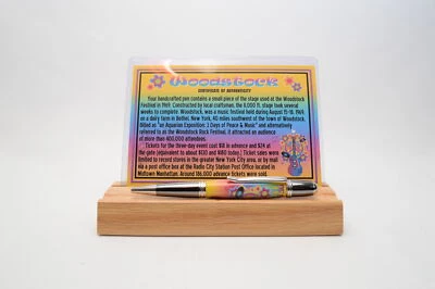 Pen Featuring a Small Piece of Woodstock Stage Wood and Cast in Acrylic - image 1 of 4