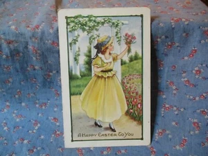 Postcard A Happy Easter to You Girl in Yellow Bouquet of Flowers - Picture 1 of 2