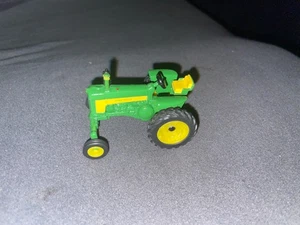 1/64 Scale John Deere Wide Front Tractor Ertl Die-Cast - Picture 1 of 4
