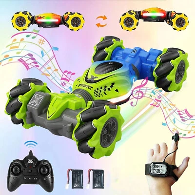 Kinder Ferngesteuertes Auto 4WD 2.4Ghz RC Stunt Car Gestengesteuertes Rennauto - Bild 1 von 4
