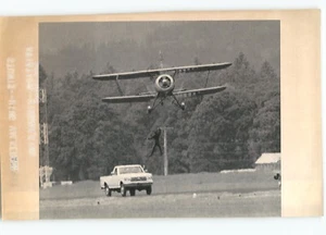 STUNTS Lee Oman Dangles from BIPLANE Air Show HILLSBORO OR 1991 Press LaserPhoto - Picture 1 of 2