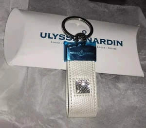 SCHLÜSSELANHÄNGER ORIGINAL ULYSSE NARDIN WEISS LEDER & SWAROVSKI KRISTALL | NEU IM KARTON - Bild 1 von 11