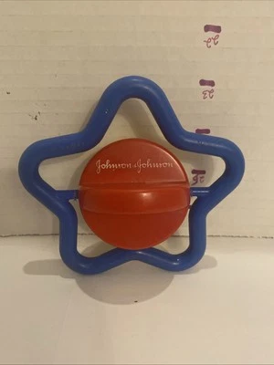 Johnson & Johnson спиннинг звезда погремушка детская игрушка винтажный красный желтый синий 1980-х - Изображение 1 из 4