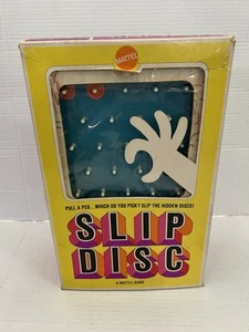 Juego de clavijas de disco oculto de mesa Slip Disc de Mattel 1969 de colección raro Pinko NS - Imagen 1 de 8