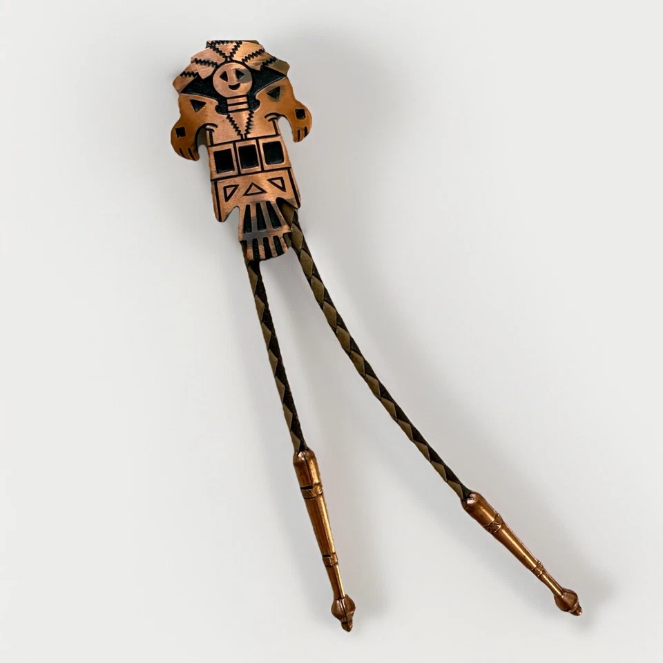 Corbata vintage de cobre sureste Thunderbird Bolo cuero trenzado azteca suroeste Foto 1 de 4