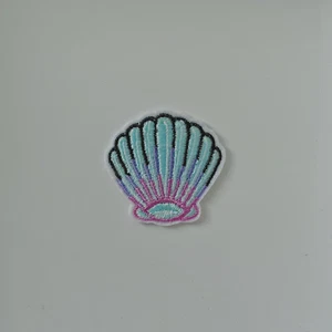 PARCHE APLIQUE BORDADO MAR CONCHA PEQUEÑA SIRENA COSER O PLANCHAR EN NOVEDAD - Imagen 1 de 1