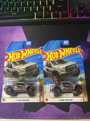 Hotwheels 2025 Mainline Zamac 17 Ford F-150 Raptor Lote de 2 Coches Foto 1 de 4