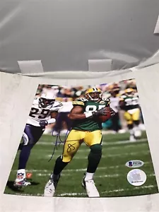 Foto firmada de Greg Jennings por los Green Bay Packers 8x10 autografiada de Beckett BAJO CERTIFICADO DE AUTENTICIDAD 1A - Imagen 1 de 4