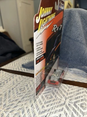 COCHE MAZDA RX-7 1982 JOHNNY LIGHTNING 1/64 rojo y al revés en paquete desde  Foto 1 de 4