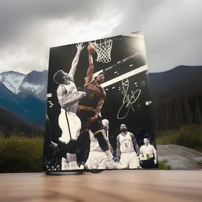 Foto firmada 11x14 por Iman Shumpert Cleveland Cavaliers campeón de la NBA con pegatina global Foto 1 de 2