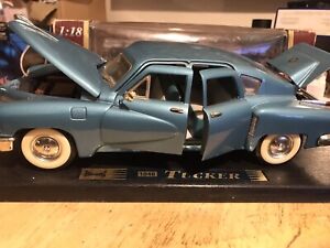 ROAD LEGENDS ( SIGNATURE) 1.18 SCALE - 1948 TUCKER - OCEAN BLUE- GOOD USED BOXED