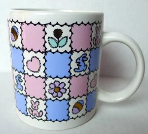 Easter Mug Pastel Pink and Blue Colors Bunnies Eggs and Hearts Decorated - Picture 1 of 5