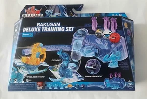 JUEGO DE ENTRENAMIENTO BAKUGAN DELUXE CON MANTIDA DE ATAQUE ESPECIFICADO, OCTOGAN Y DRAGONOIDE DE TITANIO - Imagen 1 de 4