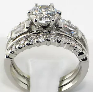 Set 3 pz anello fascia donna acciaio inox fidanzamento matrimonio tondo baguette zirconi - Foto 1 di 4