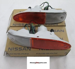 JUEGO DE LÁMPARAS DE GIRO GENUINAS NISSAN S13 180SX JDM CHUKI ÁMBAR/CLARO - Imagen 1 de 4