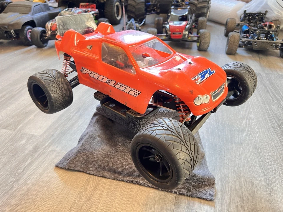 Camión de estadio Team Losi XXX-NT 1/10 2x2 Nitro RC con motor Mach .15 de colección Asis Foto 1 de 4