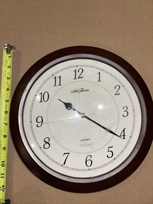 SETH THOMAS "AUTOSET" Automatic time zone quartz wall clock 12” Wood Grain Style - Image 1 of 4