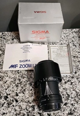 Sigma UC Zoom 70-210mm 1:4-5.6 UC MF Lens Canon AF Made In Japan w/ Box Papers - Image 1 of 4