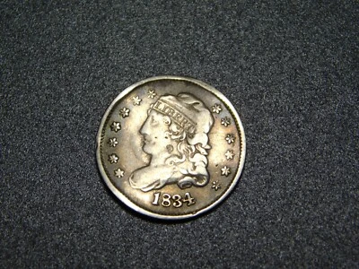 MONEDA ANTIGUA PLATA EE. UU. BUSTO TAPADO MEDIA MONEDA DE DIEZ CENTAVOS 5C DOBLADA Foto 1 de 4