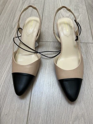 Woman Pumps feature a Cap pointy toe, mid block heel and slingback strap.NWT 8B - Image 1 of 4