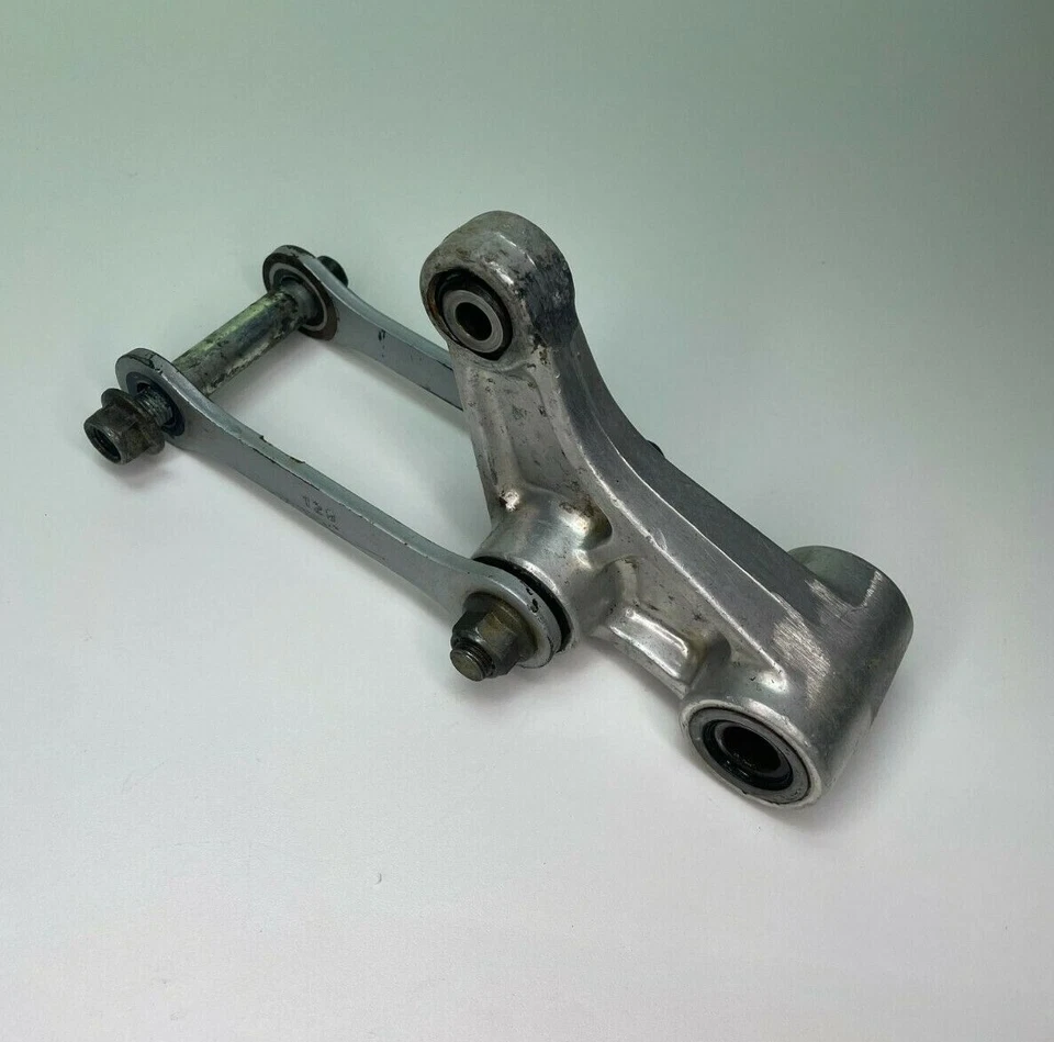1991 Kawasaki KDX250 KDX 250 OEM REAR SHOCK LINKAGE LINK - Image 1 of 4