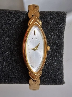 Vintage Seiko Watch Women Gold Tone Oval Dial 2E20-7489 New Battery flex band" - Image 1 of 4