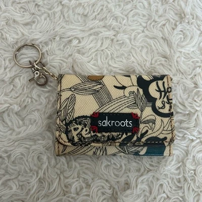 Carteira chaveiro Sacroots artística bege e preta - Imagem 1 de 4