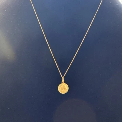 "Pequeño colgante redondo querubín 14kt .64g con cadena de oro macizo 10k 18"" .40g" Foto 1 de 4