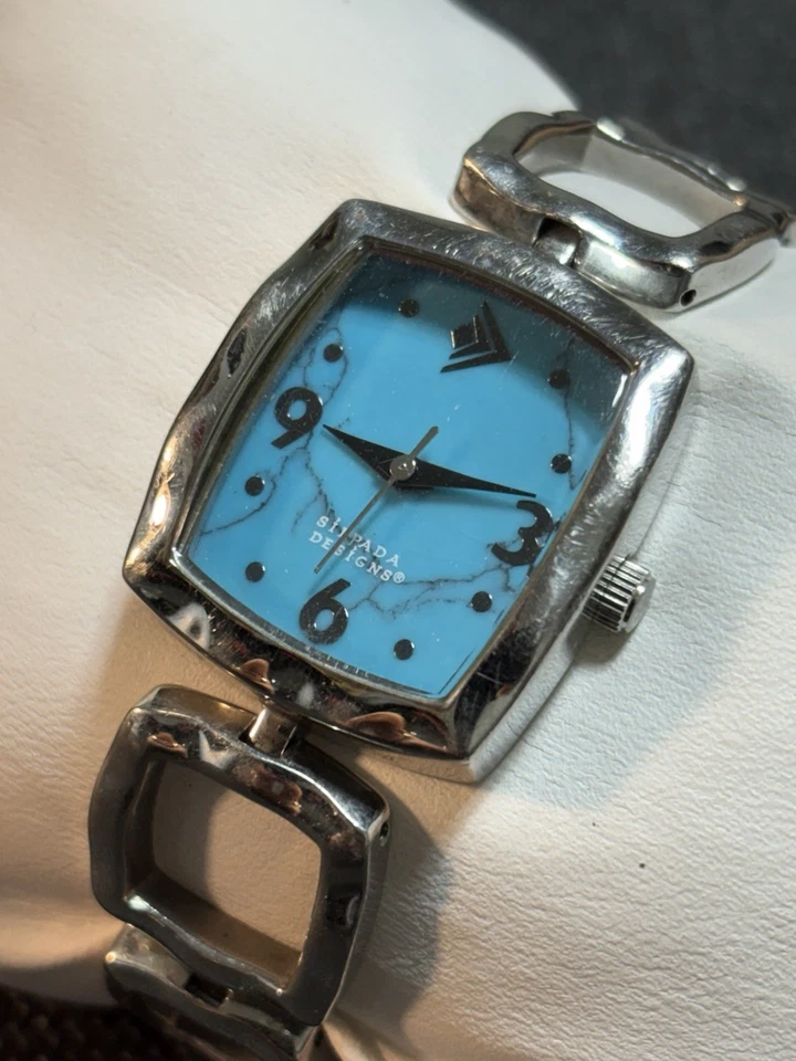 Reloj para mujer todo acero inoxidable de diseño Silpada tono plata, esfera turquesa Foto 1 de 4