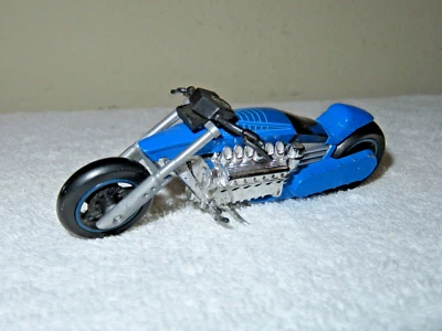 MATTEL  V-12 BLUE MOTORCYCLE 1:18  SCALE APPROX 5" LONG (12.7 CM) - Image 1 of 4