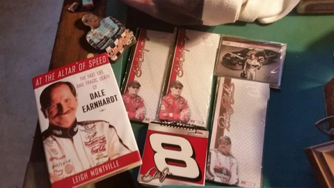 Dale Earnhardt and Dale Jr books, writing pads, magnets etc... Free Shipping!!!! Cover