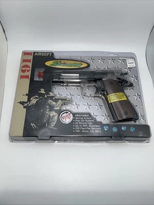 Airsoft vintage Colt 1911 movido a mola com brinquedo a laser  - Imagem 1 de 4