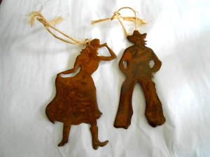 Western Christmas Tree Ornaments (2) Cowboy & Cowgirl w/raffia strings, painted - Picture 1 of 4