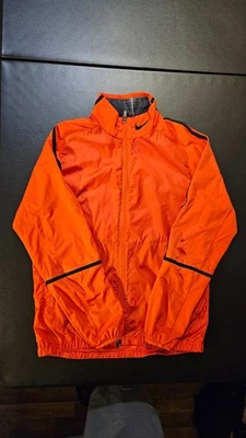 Chaqueta cortavientos Nike Golf cremallera completa manga larga para hombre S roja Foto 1 de 4