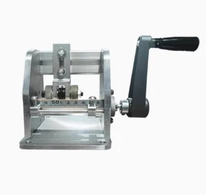 Handgekurbelte und elektrische Mehrzweck-Handkantenanleim- und Schneidemaschine - Bild 1 von 9