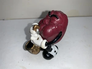 Figura de plástico California Raisin Saxofonista 1987 - Imagen 1 de 3