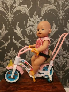 Bicicleta de juego y diversión Baby Born con muñeca  - Imagen 1 de 12