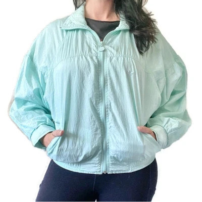 Chaqueta cortavientos vintage años 80 ADIDAS turquesa talla mediana Foto 1 de 4