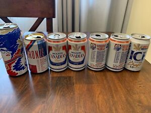 Molson Canadian Empty Collectable Can Set ( 7 cans ) Grey Cup, Olympics and more